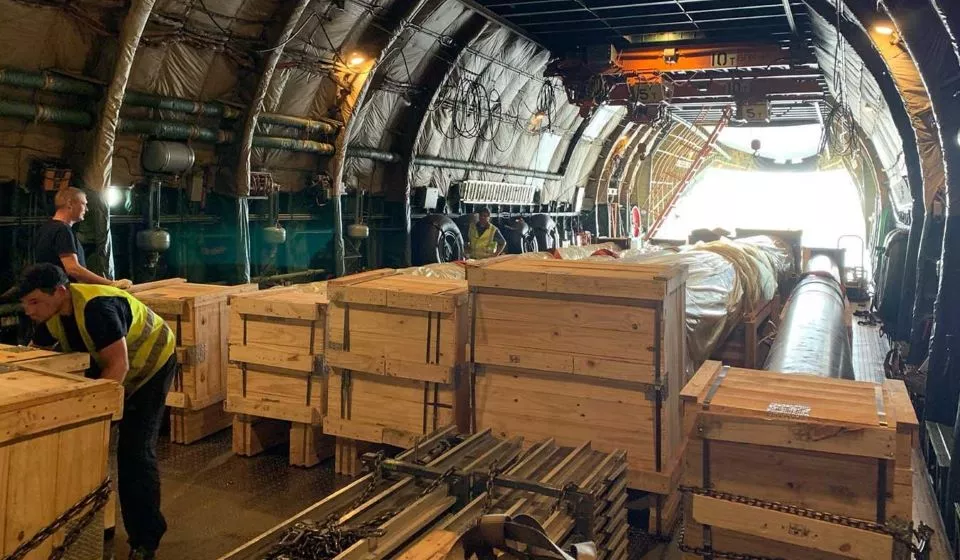 South Wind employees packing an aircraft